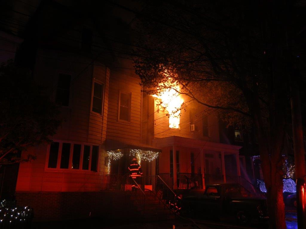 Flames shoot from a window during Weehawken fire