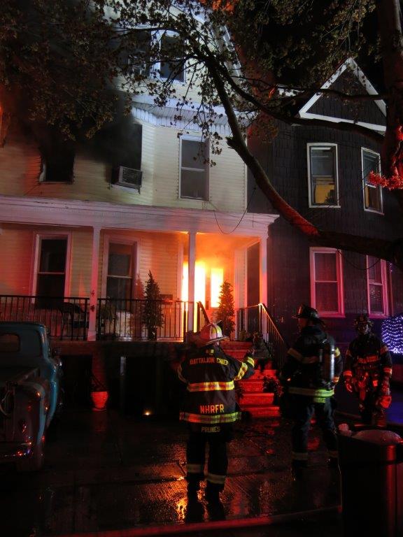 Firefighters with fire inside home at Weehawken fire