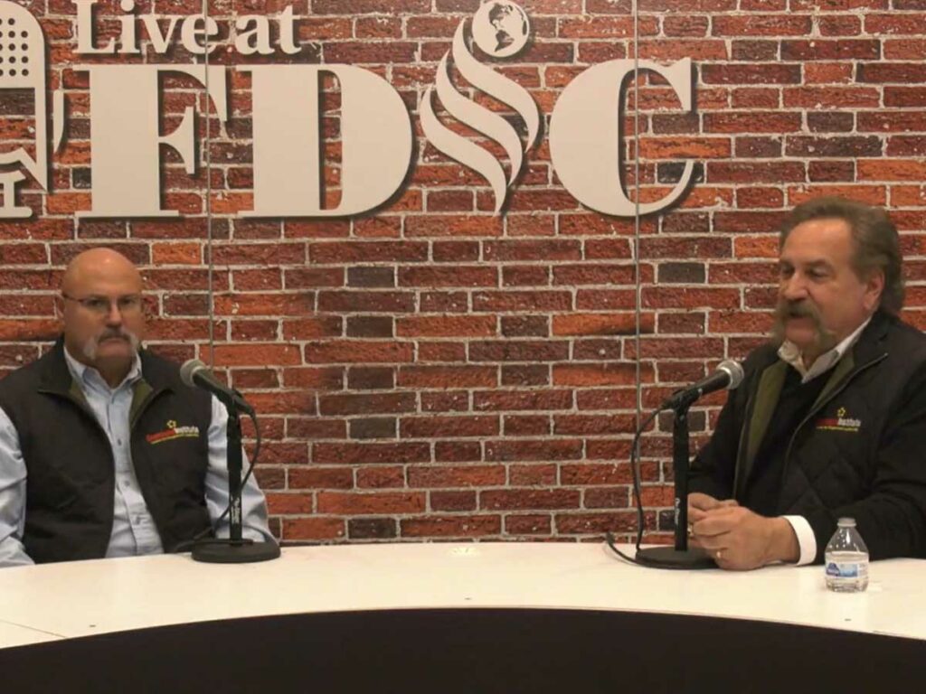 Doug Cline and Chris Naum at FDIC International 2023