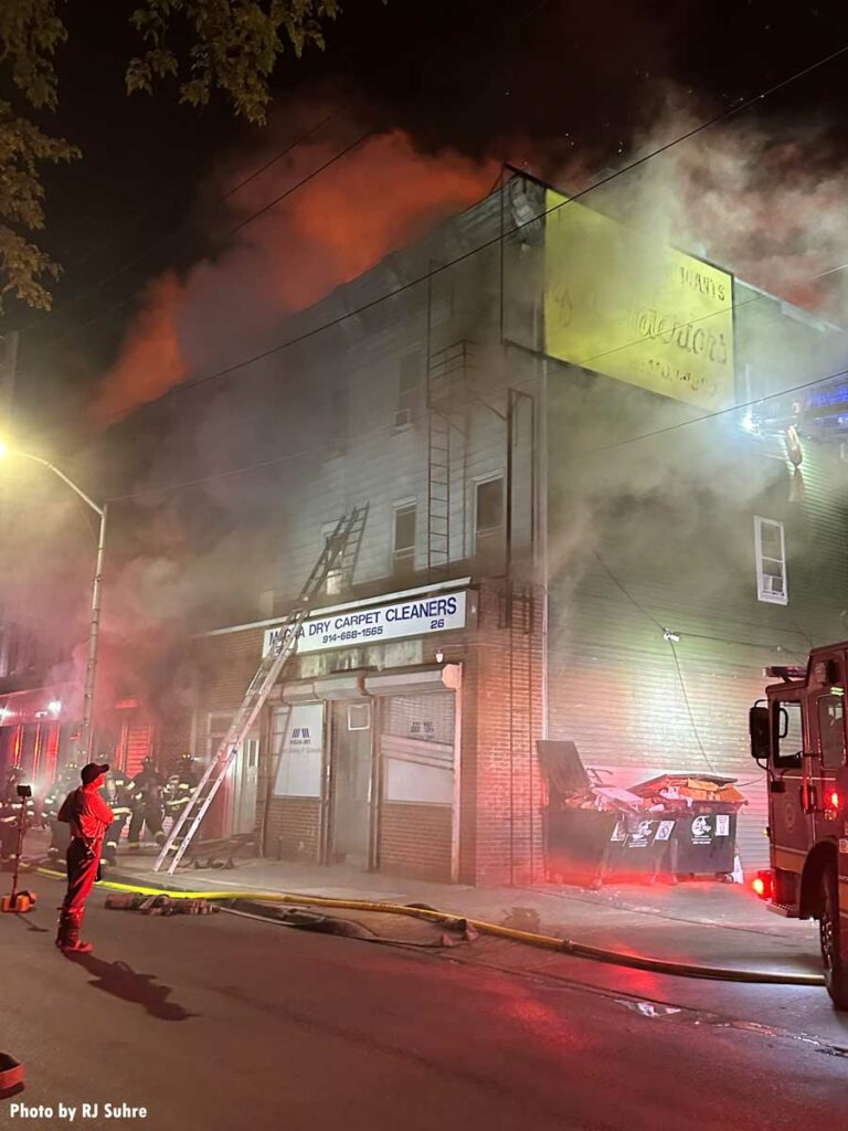 Firefighters and ladder at Mount Vernon New York structure fire