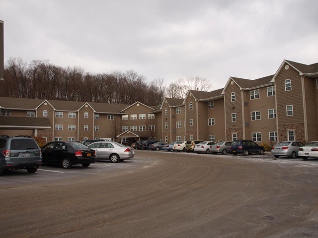 Exterior of three-story apartment building