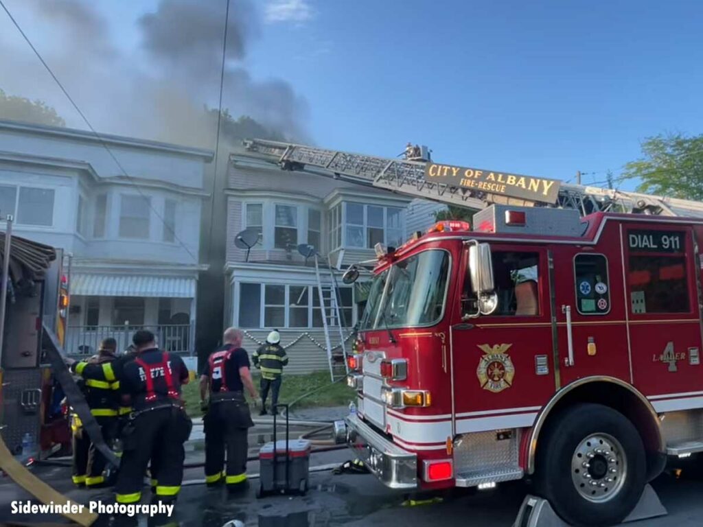 Albany fire truck and firefighters at house fire