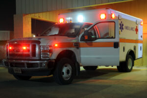 Senior Airman John Sharrow, a medical technician assigned to the 386th Expeditionary Medical Group performs an operational check of the lights and sirens on an ambulance prior to a shift change at an undisclosed base in Southwest Asia Mar. 6, 2013.