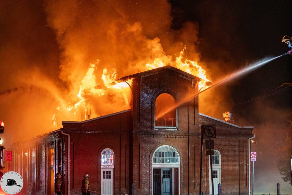 Master stream and flames at outdoor market fire Harrisburg Pennsylvania