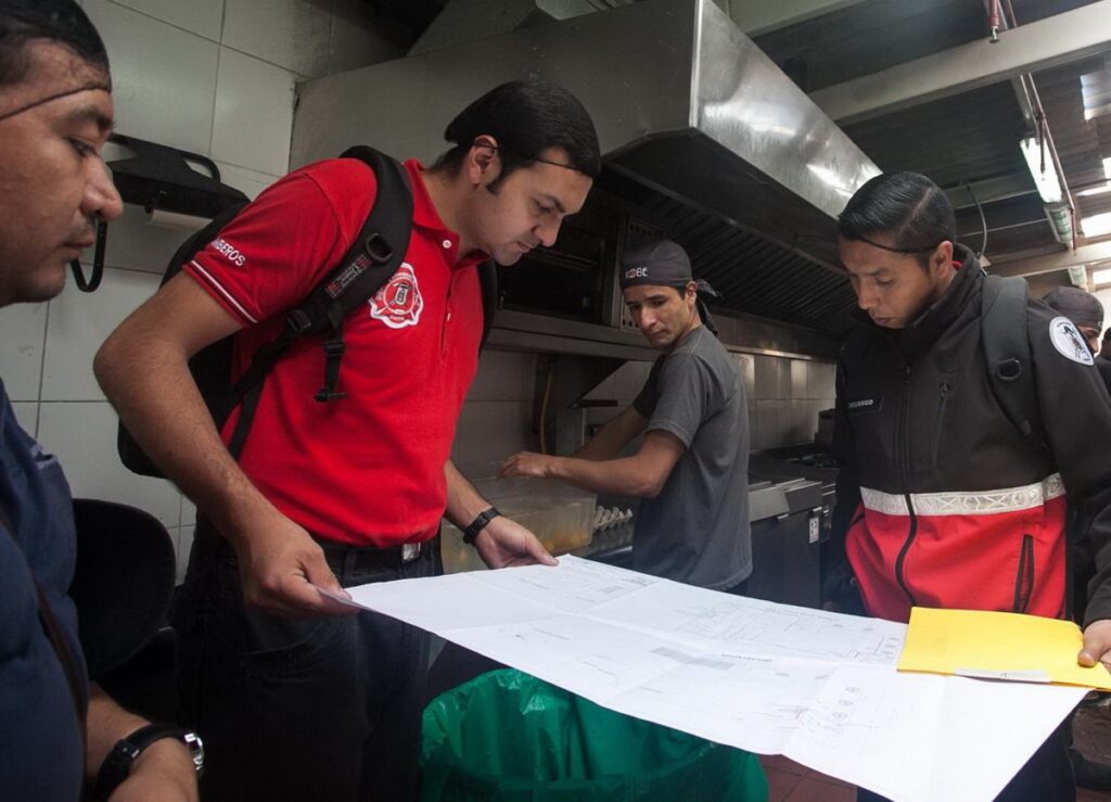 Quito firefighters look at plans