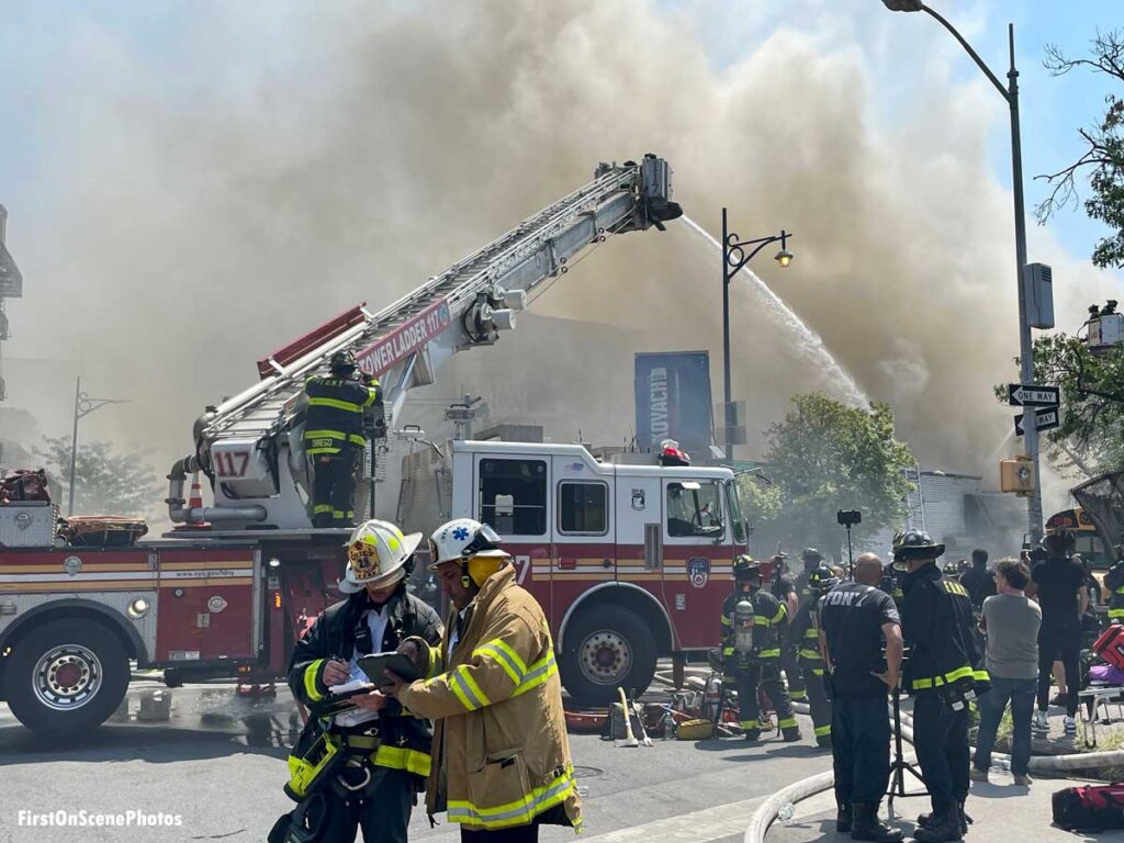 FDNY Tower Ladder 117 flowing water at Brooklyn fire