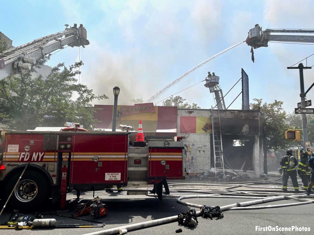 Elevated streams from tower ladders at Brooklyn fire