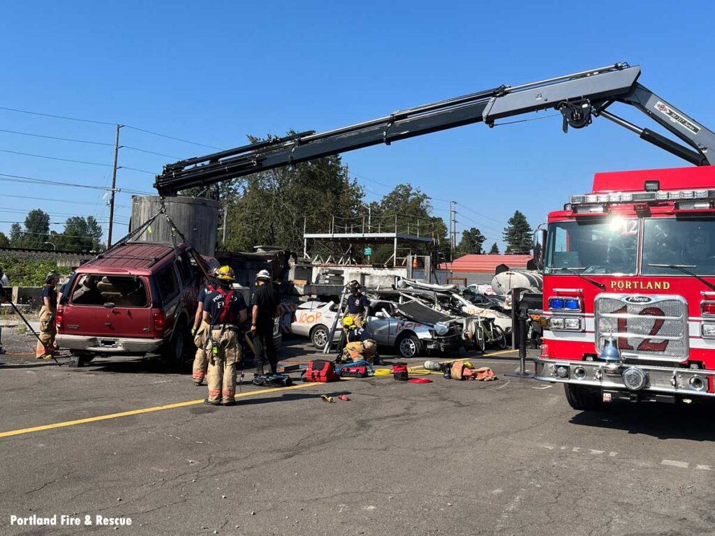 Portland firefighters undertake joint training with struts and squad 12s crane.