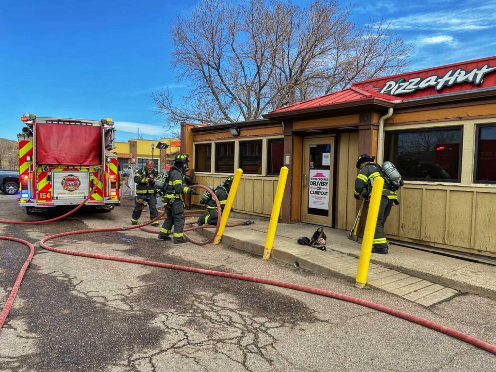 Firefighters train on fire and rescue at a restaurant