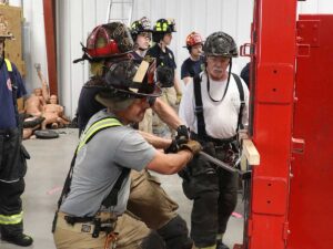 Firefighters trainin on door forcible entry