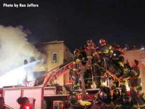 Firefighters on aerial at West New York Fire