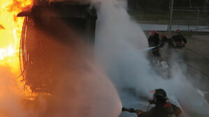 firefighters in industrial fire