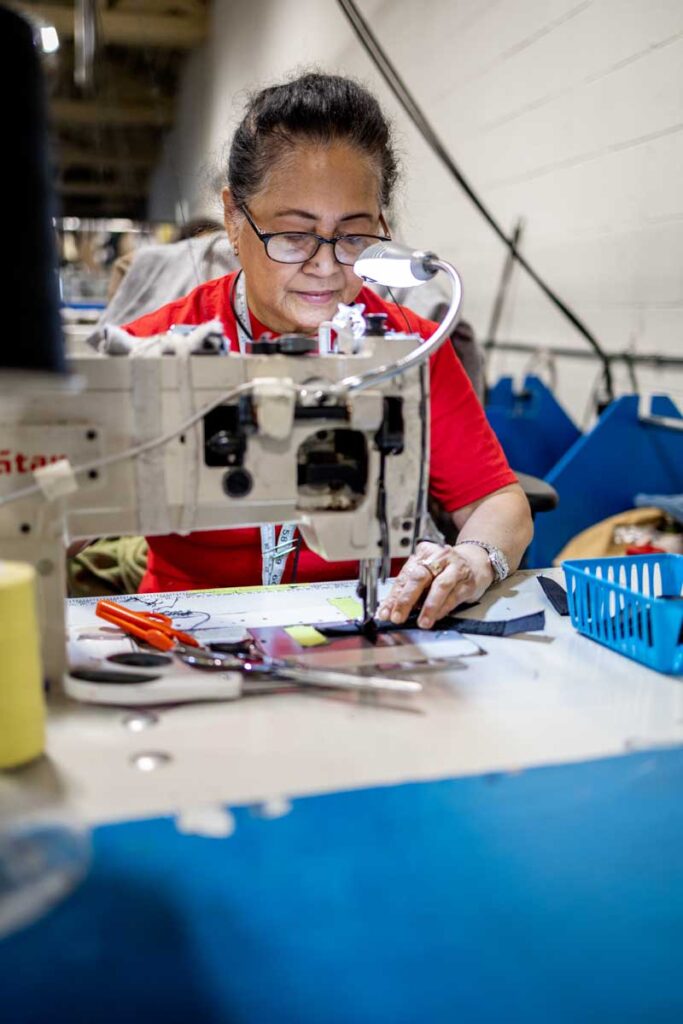 Woman working on machine