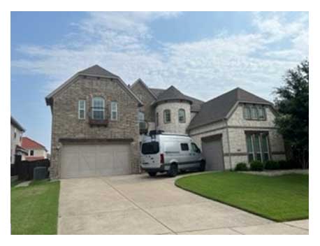 View from driveway of modern home