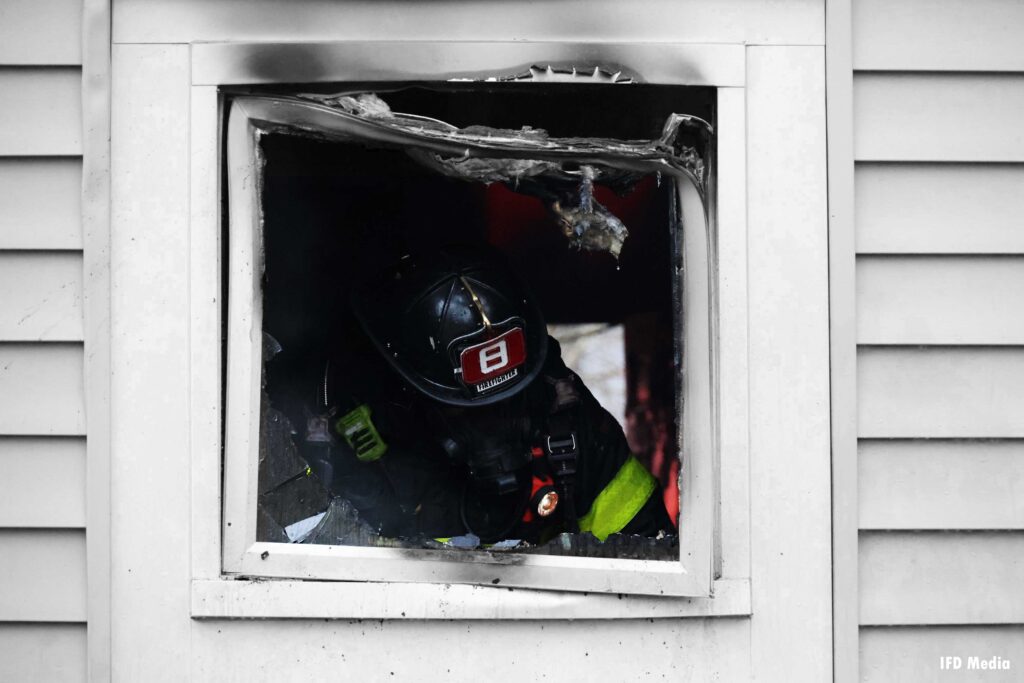 Indianapolis firefighter at window