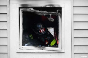 Indianapolis firefighter at window