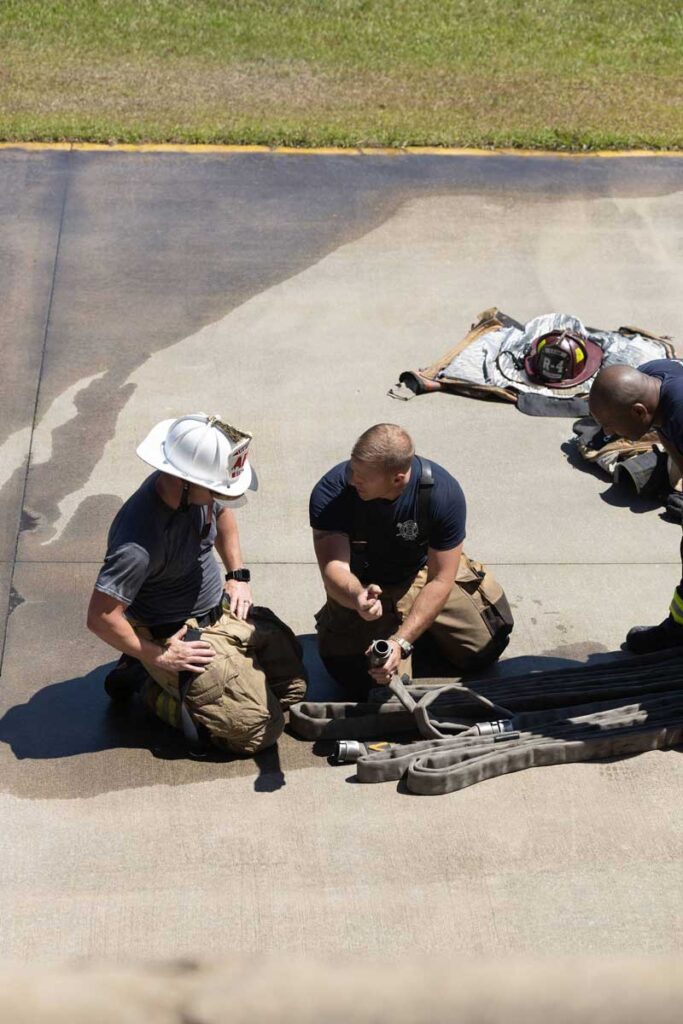 Firefighters conducting training with hoselines