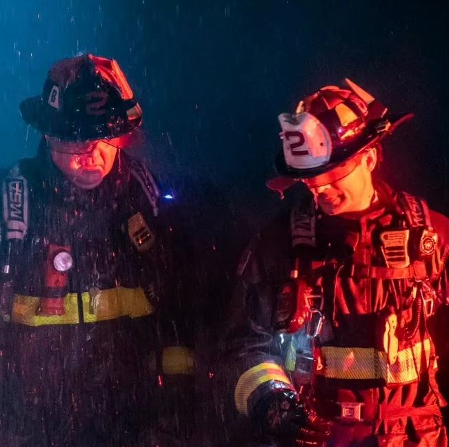 Firefighters in the rain