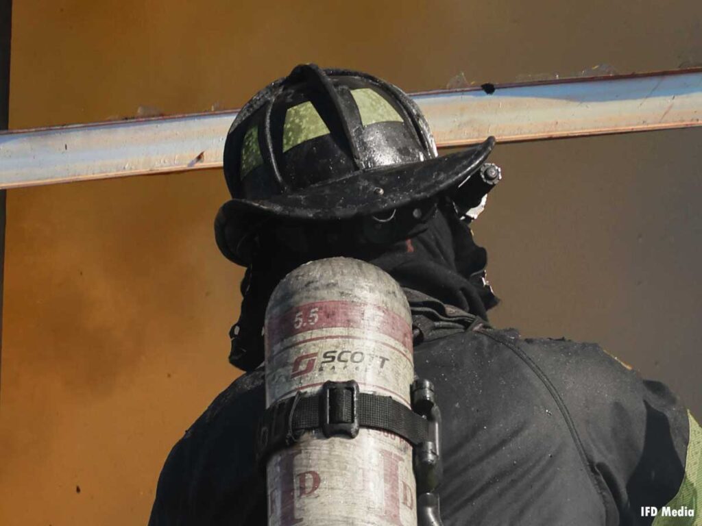 Firefighter at window