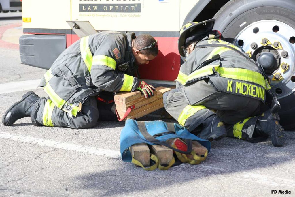 Indy firefighters use cribbing for bus rescue