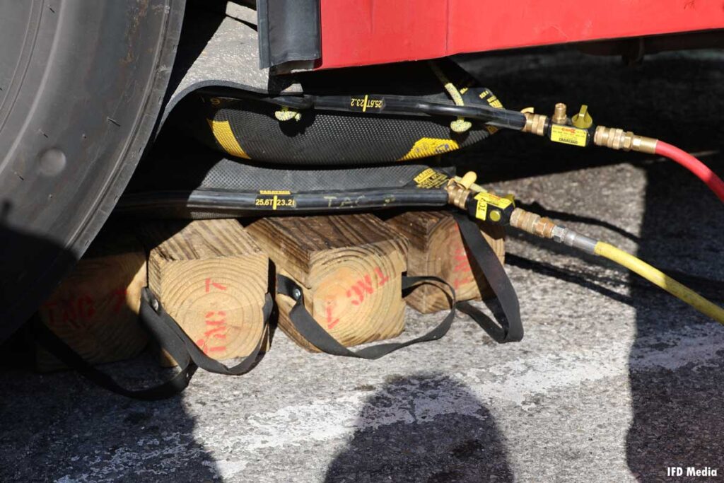 Air bags atop cribbing