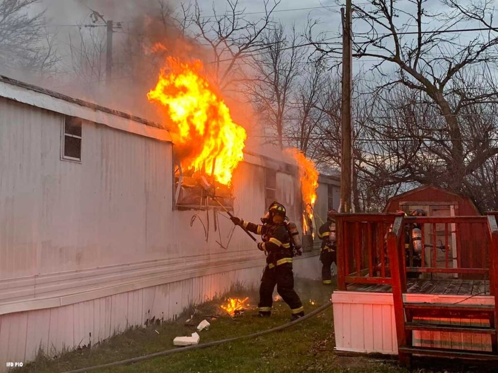 Firefighter respond to trailer home fire