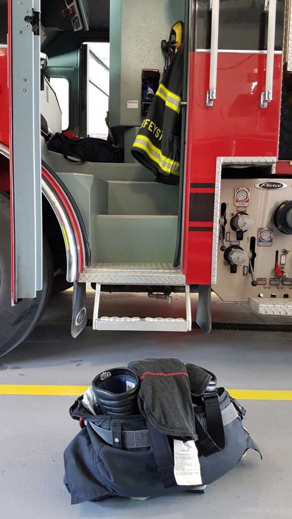 Fire gear ready to go outside apparatus