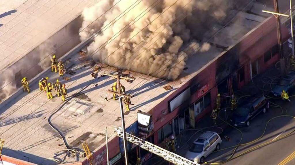 Firefighters operate at West Los Angeles fire