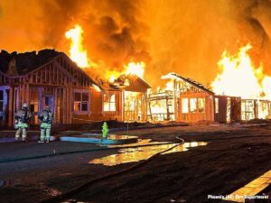 Phoenix firefighters at fire in new housing development