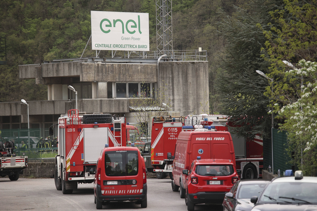 Fire trucks outside hydroelectric plant