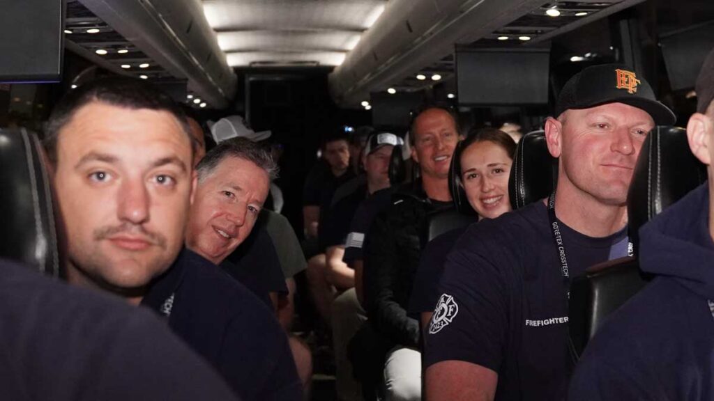 Firefighters on bus going to hands-on training