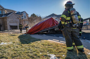 Firefighter with vehicle