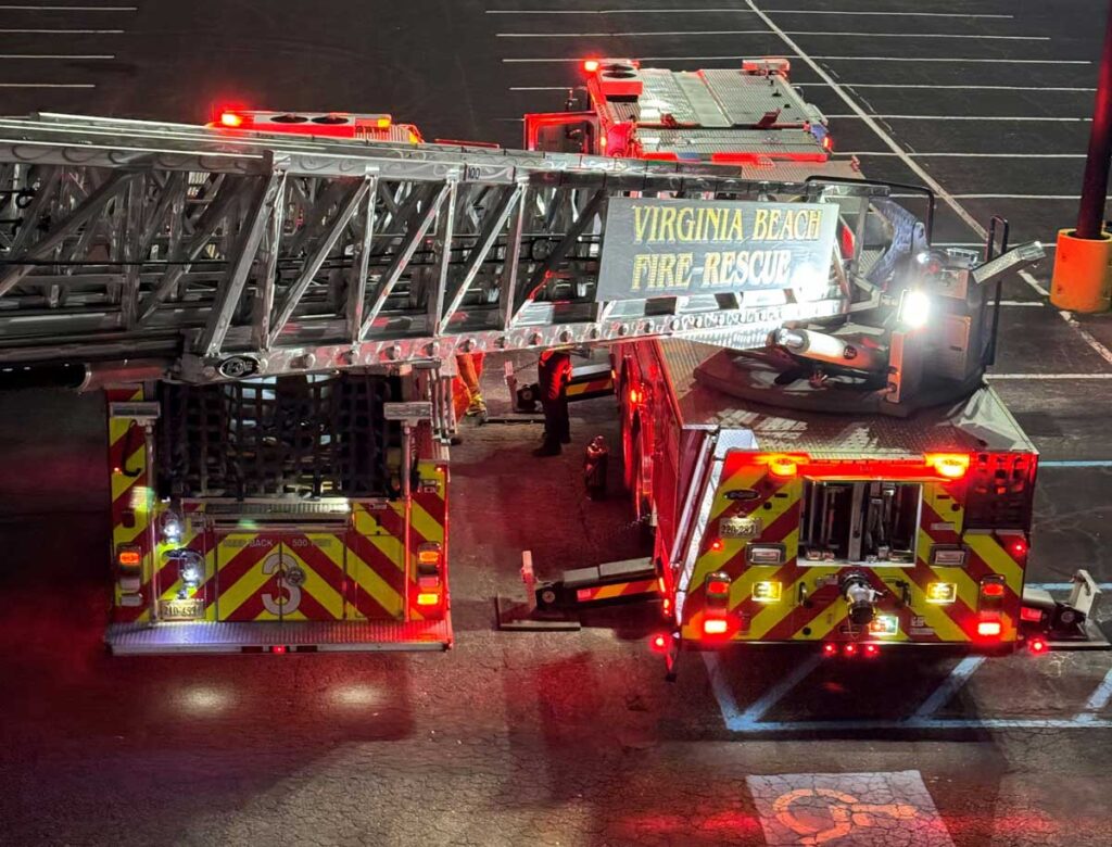 Aerial ladder extended in parking lot