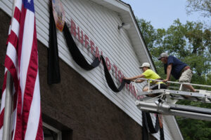 Bunting outside firehouse