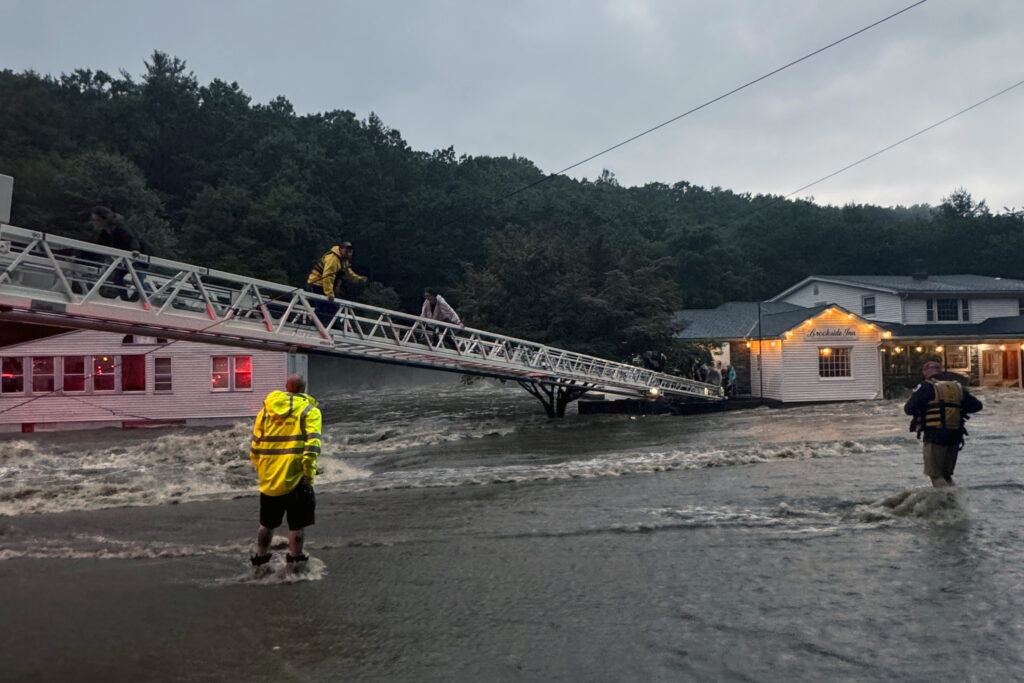 Firefighters make resuce on aerail