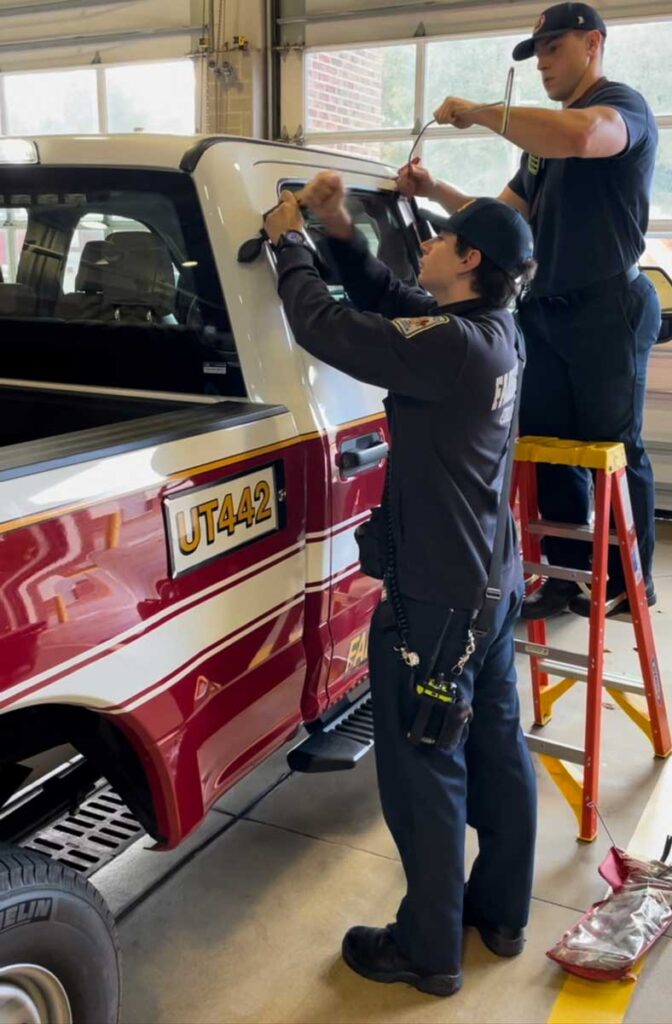 firefighters attempt to force entry