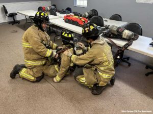 Oliver Springs firefighters train on basic down firefighter packaging and RIT pack operations.