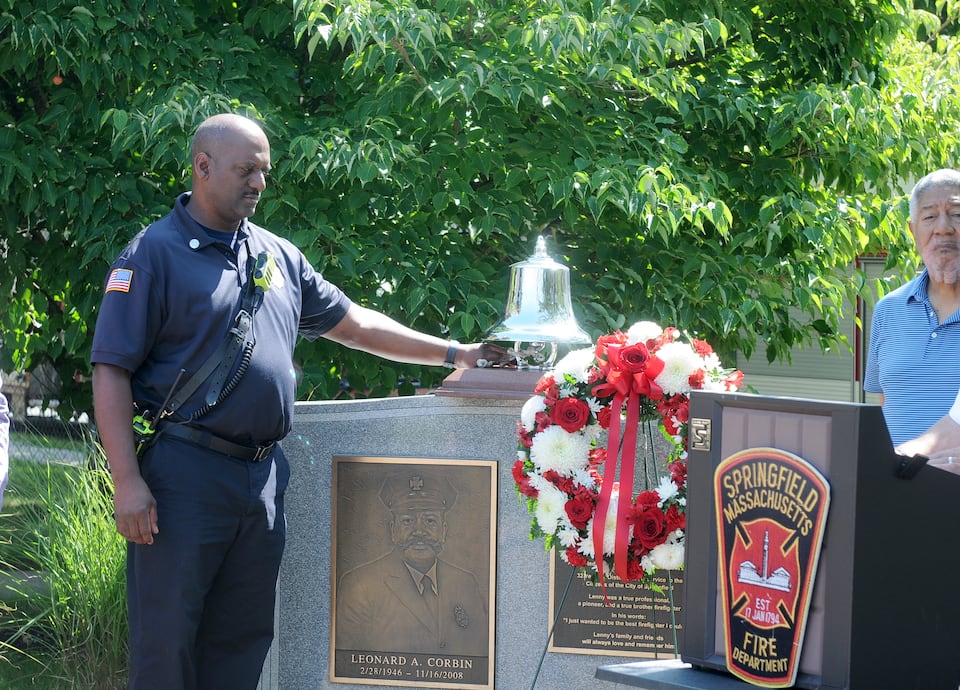 Fire Capt. Kevin Rankin rings bell