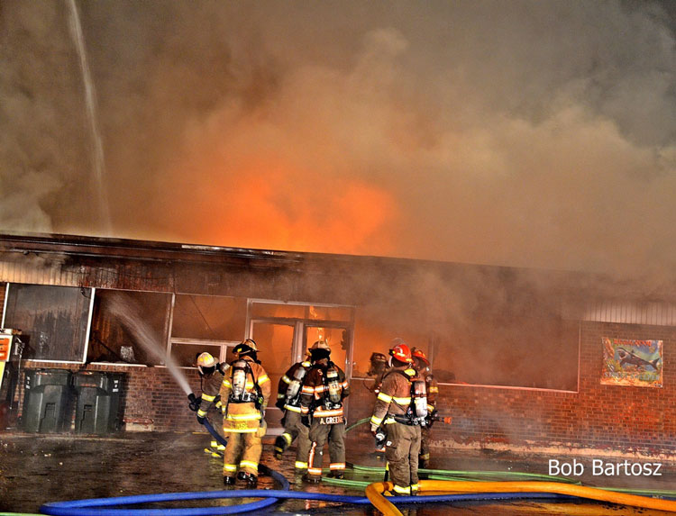 Firefighters at commercial structure