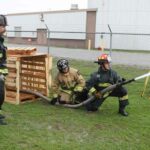 Firefighters training on hoselines