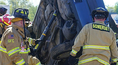 Firefighter performing vehicle rescue