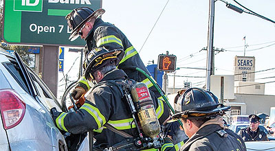 Firefighters extricating a patient