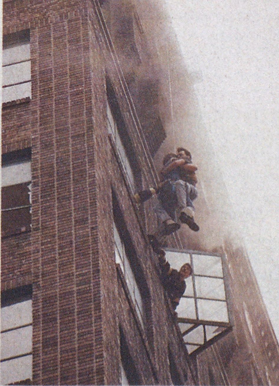 Two 12th-floor occupants, unable to escape through interior passages, were driven onto window ledges, where they still were exposed to heavy heat